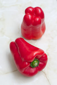 Close-up of red bell peppers on table