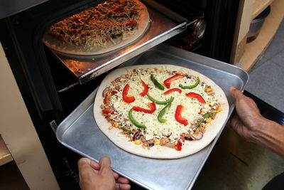 High angle view of hand holding food