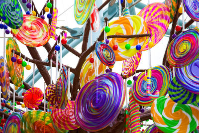 Low angle view of multi colored decorations for sale in market