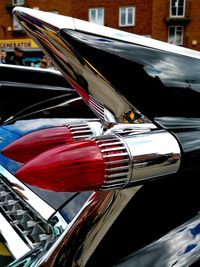 Close-up of red vintage car