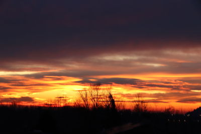 Scenic view of dramatic sky during sunset