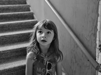 Portrait of girl on staircase