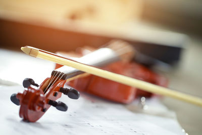 Close-up of violin on table