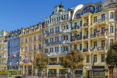 Street with beautiful historical houses in karlovy vary city center, czech republic