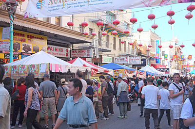 People at market stall