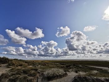 Scenic view of land against sky