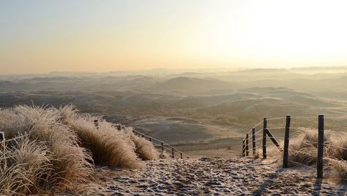 Scenic view of desert against clear sky