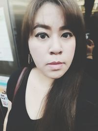 Close-up portrait of young woman