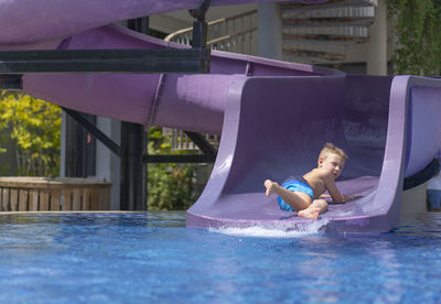 Low section of woman in swimming pool