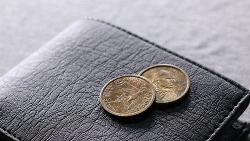 High angle view of coins on table