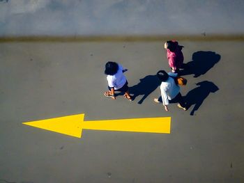 High angle view of people on road