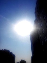 Low angle view of bright sun