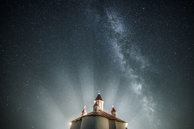 Low angle view of building against sky at night