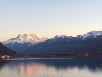 Scenic view of snowcapped mountains against sky during winter