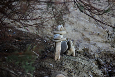 High angle view of pebble stack on rock