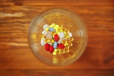 High angle view of multi colored glass on table