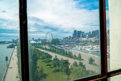 View of cityscape through window