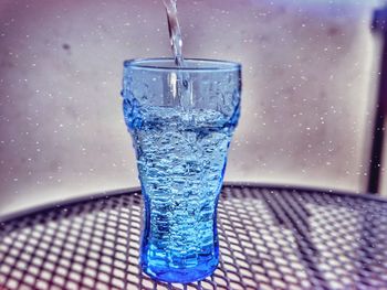 Close-up of water drops on glass