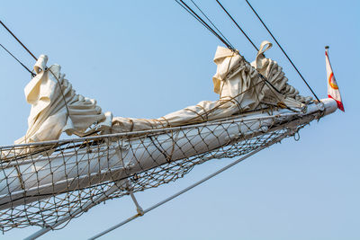Close-up of the bowsprit against clear blue sky