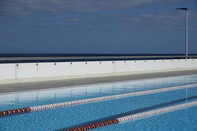View of swimming pool against sky