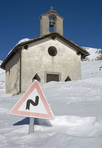 Low angle view of bell tower against sky