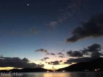 Scenic view of sea against sky at night