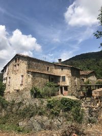 Low angle view of old building against sky