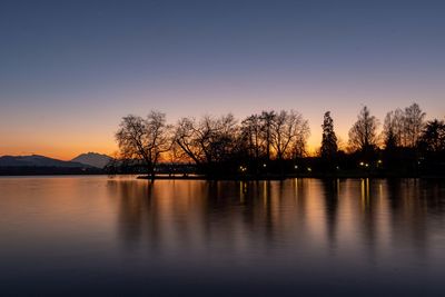 Scenic view of lake against sky during sunset in zugersee 