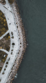 High angle view of road by sea during winter