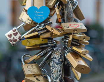 Love lock padlocks on bridge over the canal in amsterdam