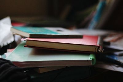 Close-up of books in darkroom