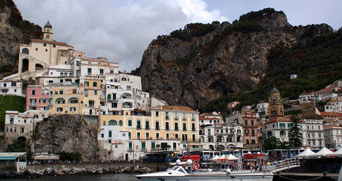 Buildings in city against sky