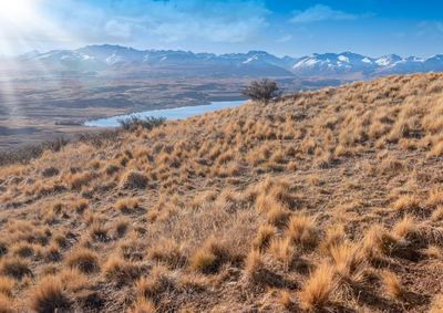 Scenic view of land against sky