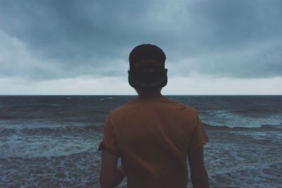 Scenic view of sea against cloudy sky