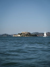 Scenic view of sea against clear sky