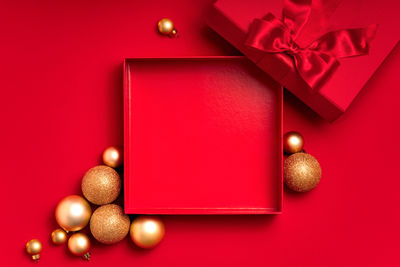 Close-up of christmas decorations on yellow background