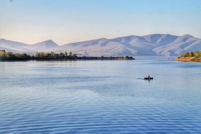 Scenic view of lake against clear sky