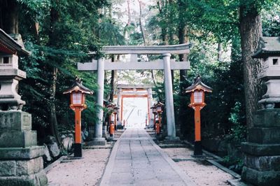 Entrance of temple against building