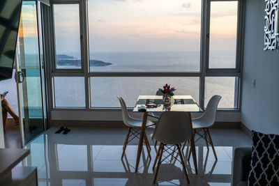 High angle view of empty chairs and tables in restaurant