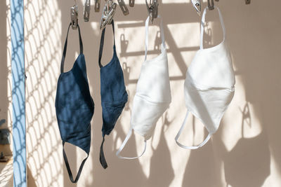 Close-up of clothes hanging on clothesline