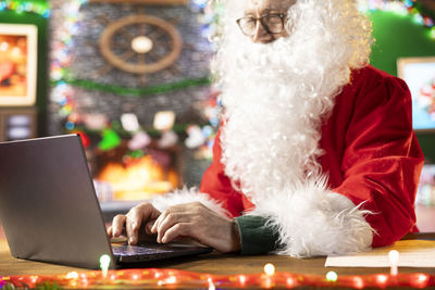 Woman using laptop at home