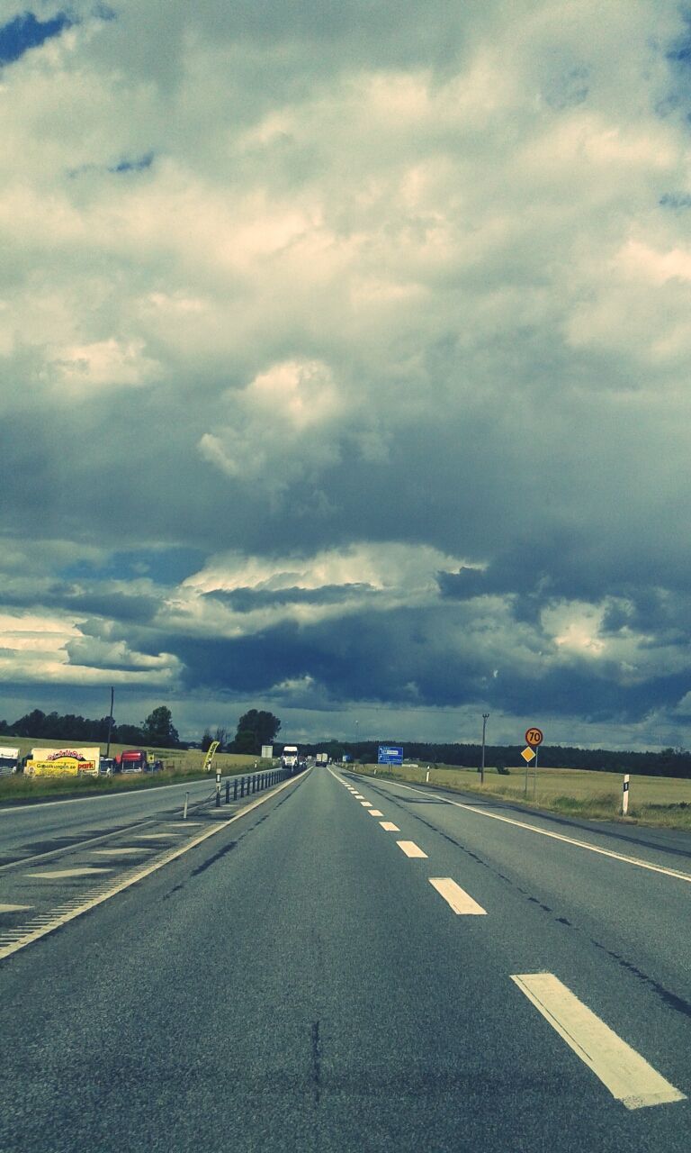 transportation, road marking, road, the way forward, sky, cloud - sky, diminishing perspective, vanishing point, street, asphalt, cloudy, car, cloud, empty, highway, empty road, country road, dividing line, land vehicle, mode of transport