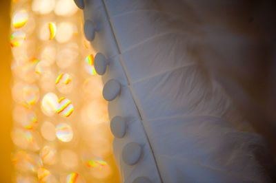 Close-up of textile against defocused lights