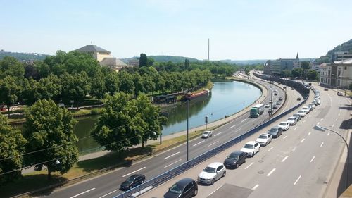 High angle view of cars on road against sky