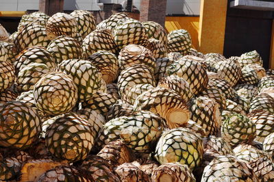 Stack of vegetables for sale in market