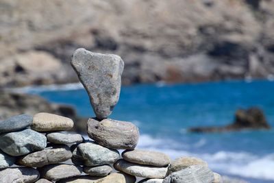 Close-up of stones on shore