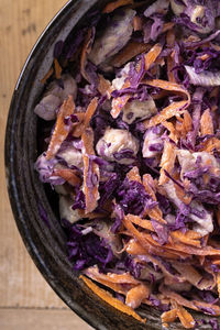 High angle view of chopped vegetables in bowl on table