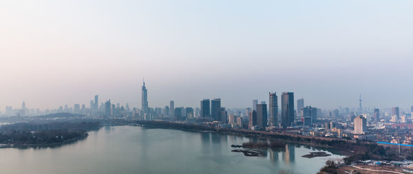 View of buildings in city against sky