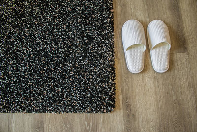 High angle view of shoes on floor