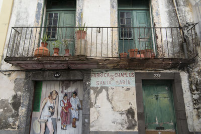 Low angle view of graffiti on old building